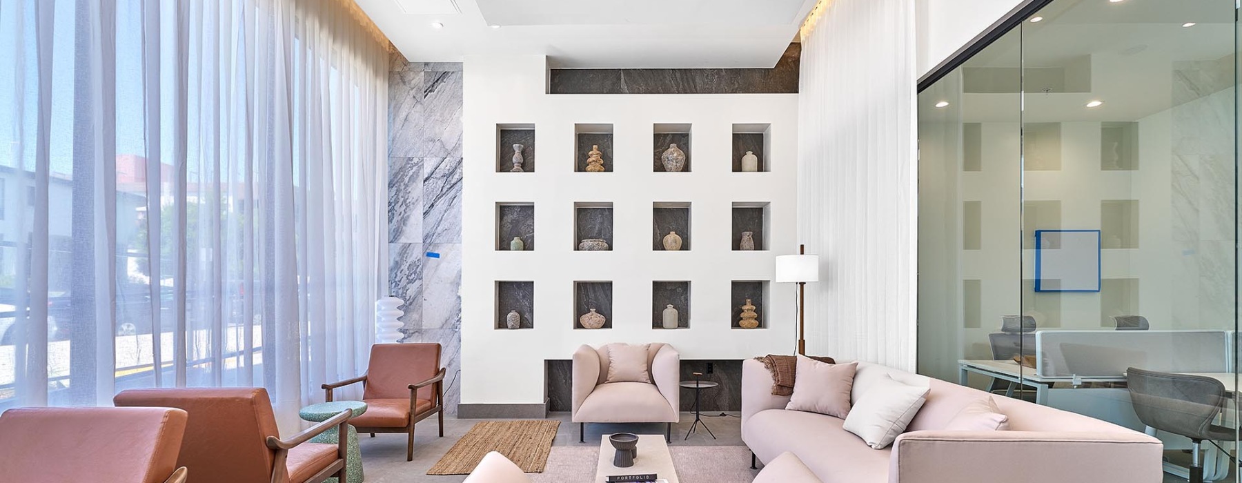 lounge with seating windows and custom shelving
